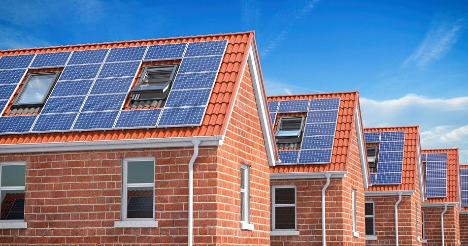 Row of house with solar panels on roof on blue sky background. 3d illustration